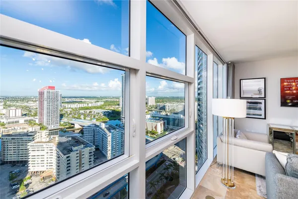 a view of a building with a yard