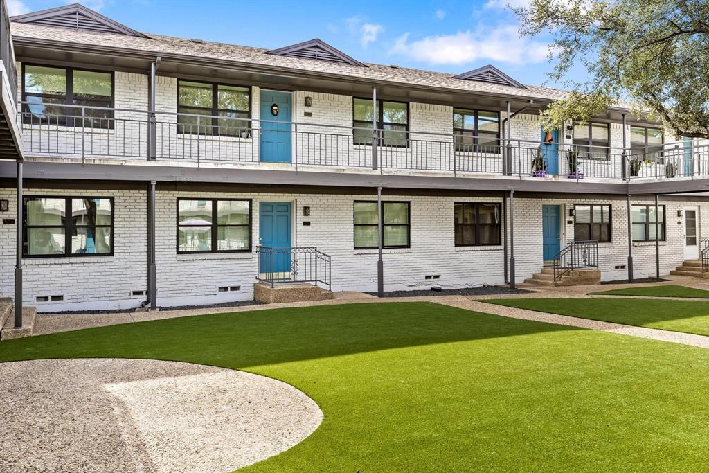 3925 Inwood Road, Unit 1017 Dallas, TX 75209 - Photo 21 of 23 a front view of a house with a yard