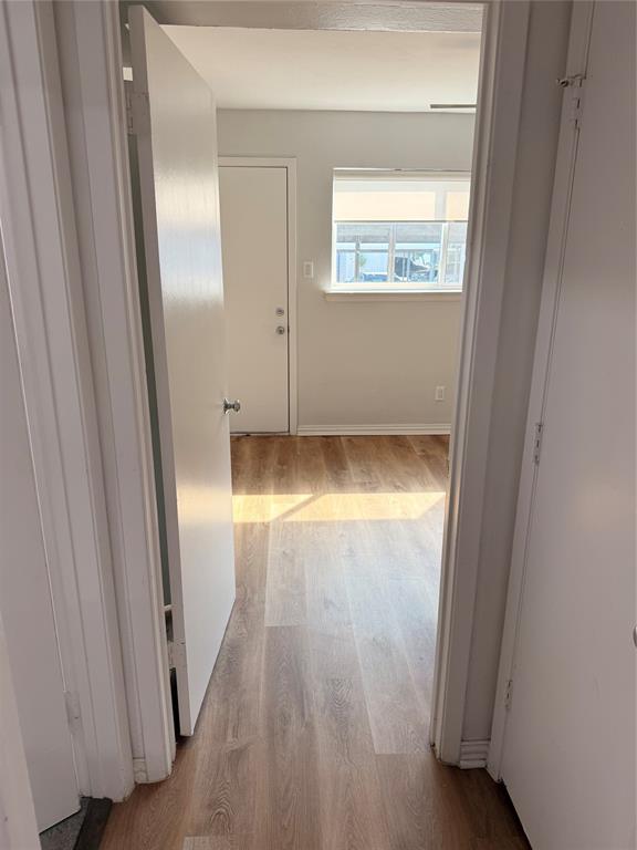 3925 Inwood Road, Unit 1017 Dallas, TX 75209 - Photo 10 of 23 a view of an empty room and window