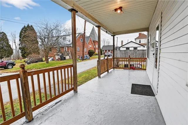 a view of balcony with furniture