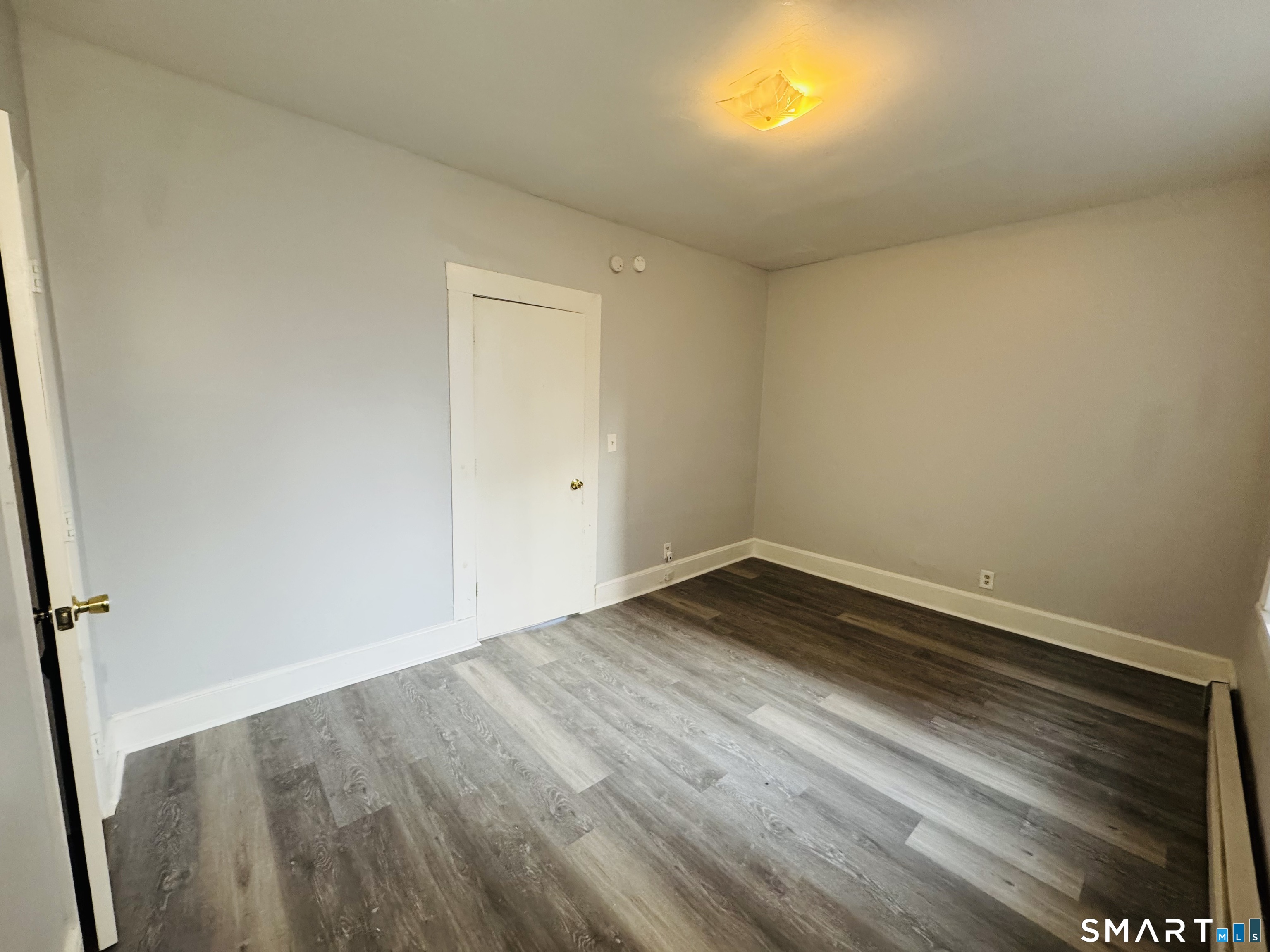 29 White Street, Unit 1 New Haven, CT 06519 - Photo 8 of 11 wooden floor in a room