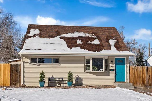 a view of a white house with a windows