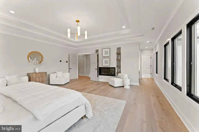 a bathroom with double vanity sinks and a two mirror