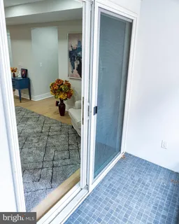 a kitchen with stainless steel appliances a stove a sink and a refrigerator