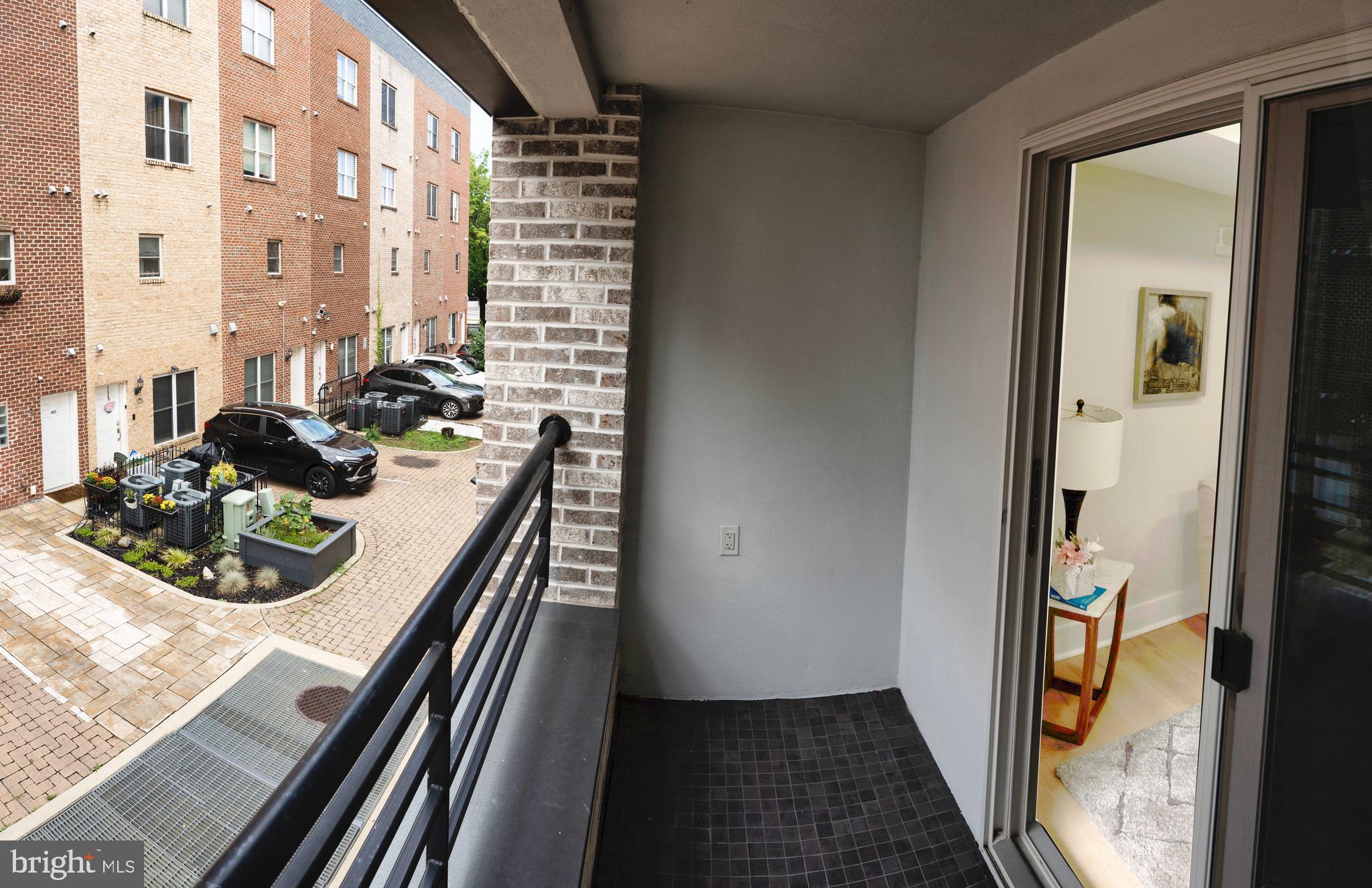 919 12th Street Northeast, Unit 202 Washington, DC 20002 - Photo 9 of 32 a view of a balcony and chairs