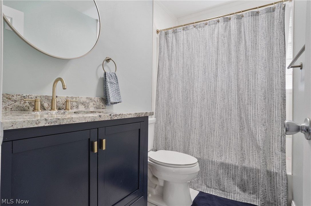 1150 Garman Road Akron, OH 44313 - Photo 20 of 38 Bathroom featuring vanity and toilet
