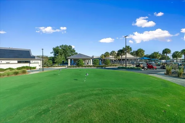 a view of a big yard with a house