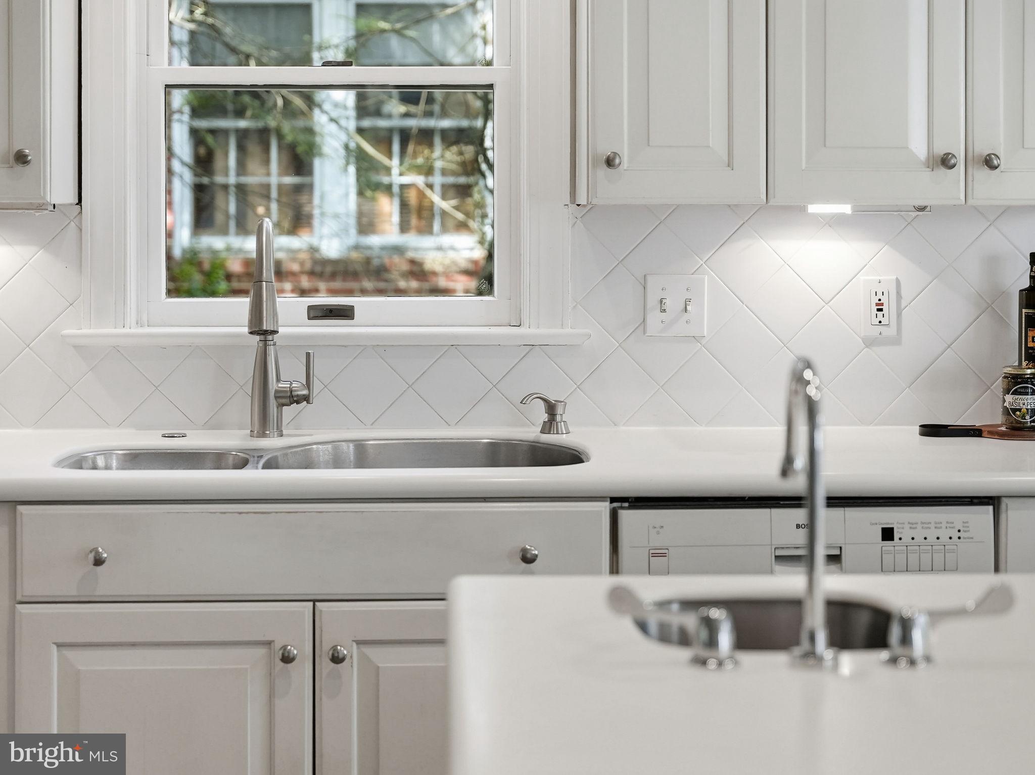 3225 North Glebe Road Arlington, VA 22207 - Photo 40 of 102 a kitchen with a sink and cabinets