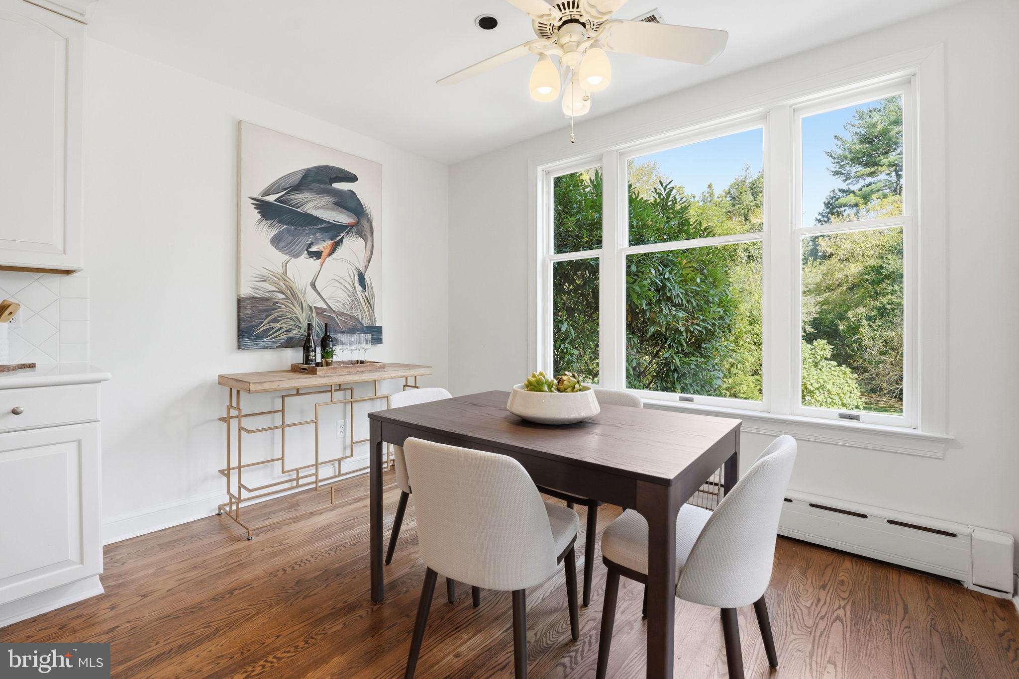 3225 North Glebe Road Arlington, VA 22207 - Photo 44 of 102 a view of a dining room with furniture window and wooden floor