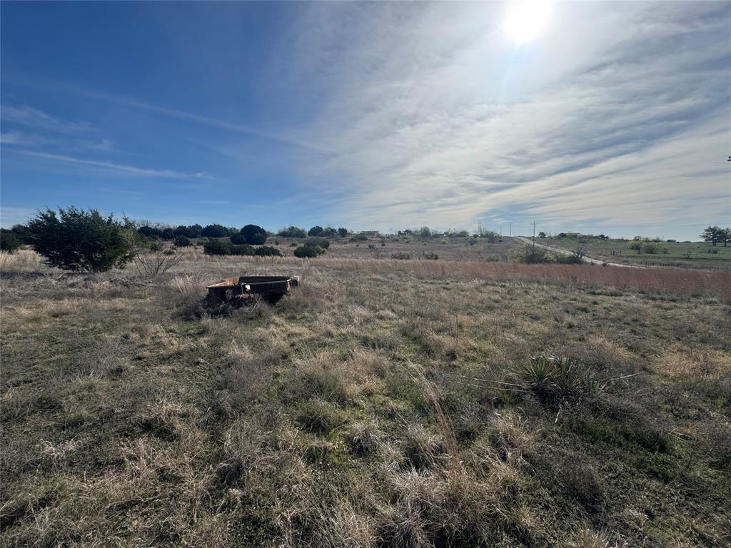 2902 North Logan Branch Hamilton, TX 76531 - Photo 3 of 6 a view of a dry field with lots of bushes