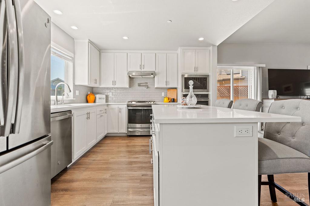 3690 Hillary Court Santa Rosa, CA 95403 - Photo 10 of 53 Pot filler built-in over the stand alone gas stove and oven.