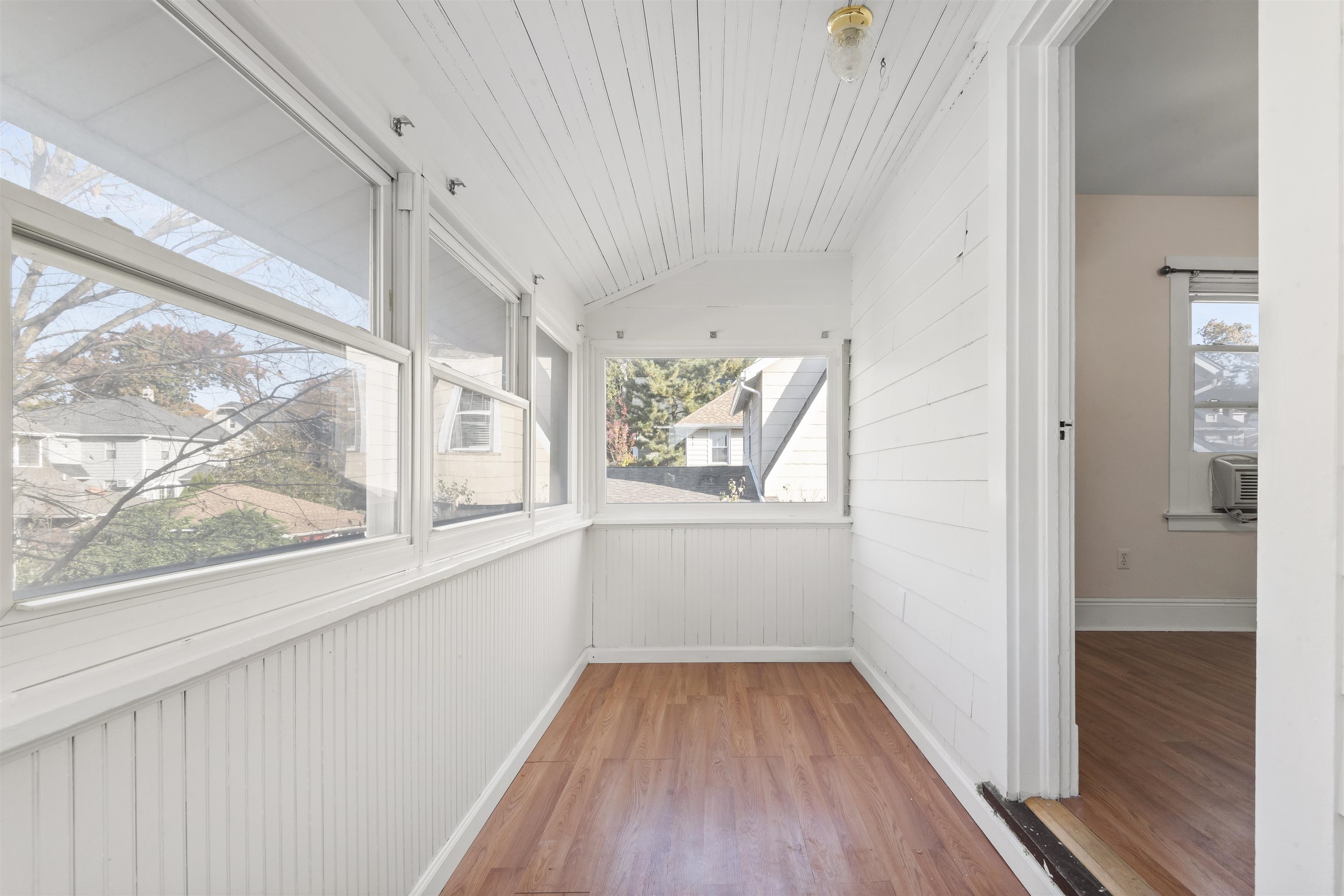 424 Lincoln Avenue Rutherford, NJ 07070 - Photo 17 of 30 a view of empty room with wooden floor and fan