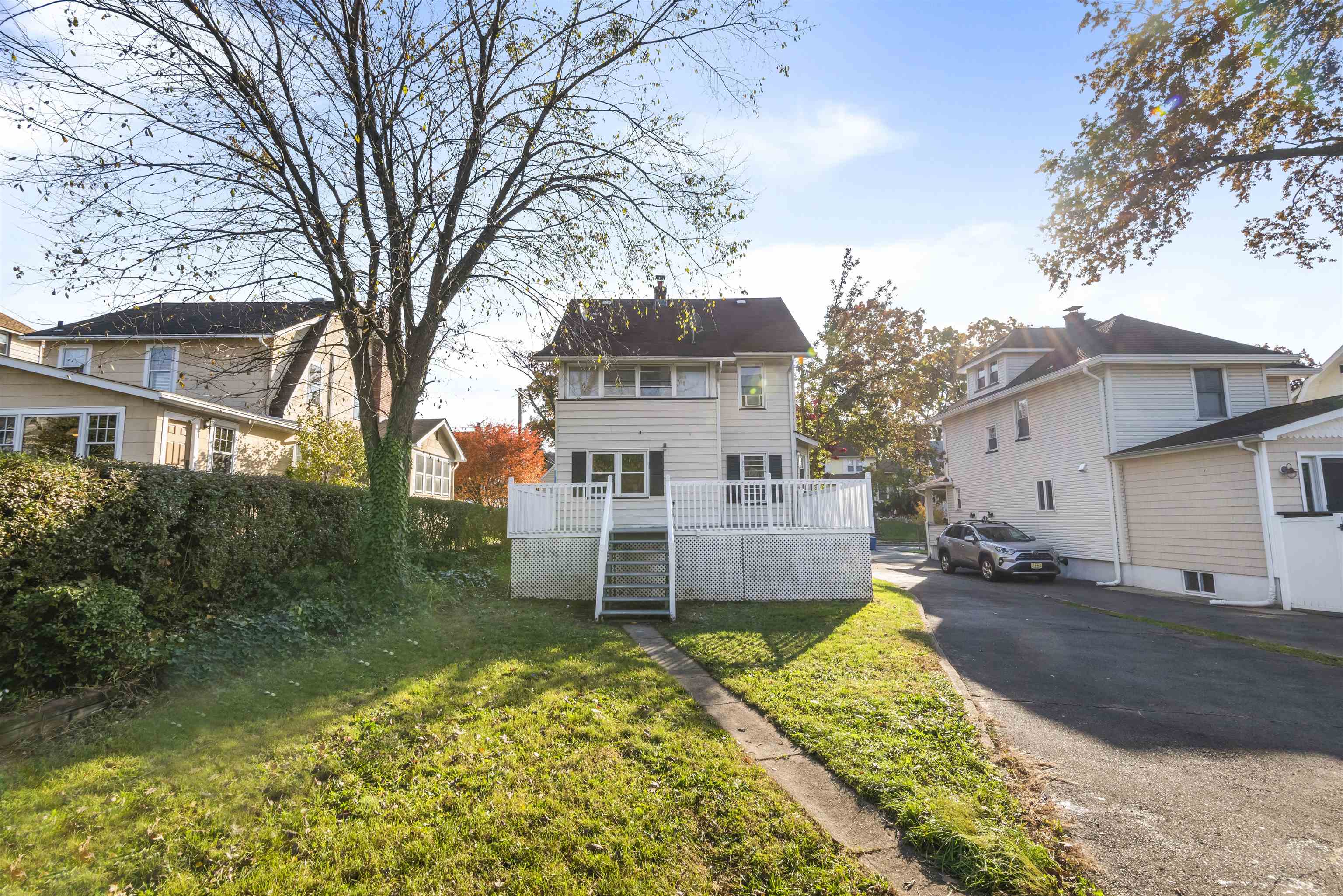 424 Lincoln Avenue Rutherford, NJ 07070 - Photo 25 of 30 a view of a house with a yard