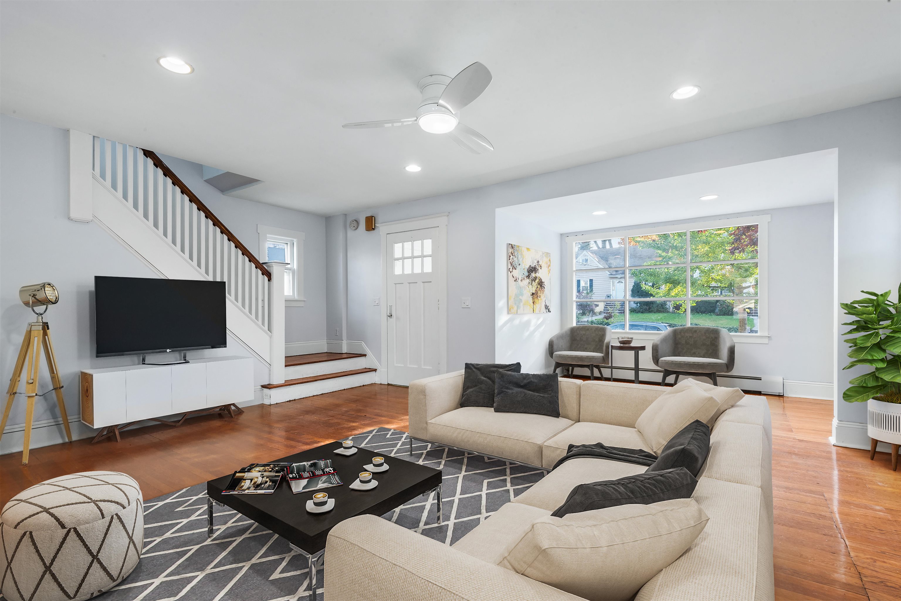 424 Lincoln Avenue Rutherford, NJ 07070 - Photo 5 of 30 a living room with furniture and a flat screen tv