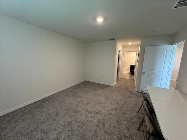 an empty room with a workbench