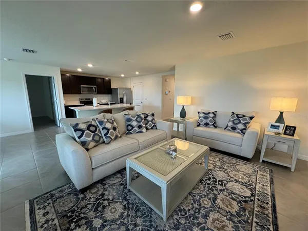 a living room with furniture and a couch