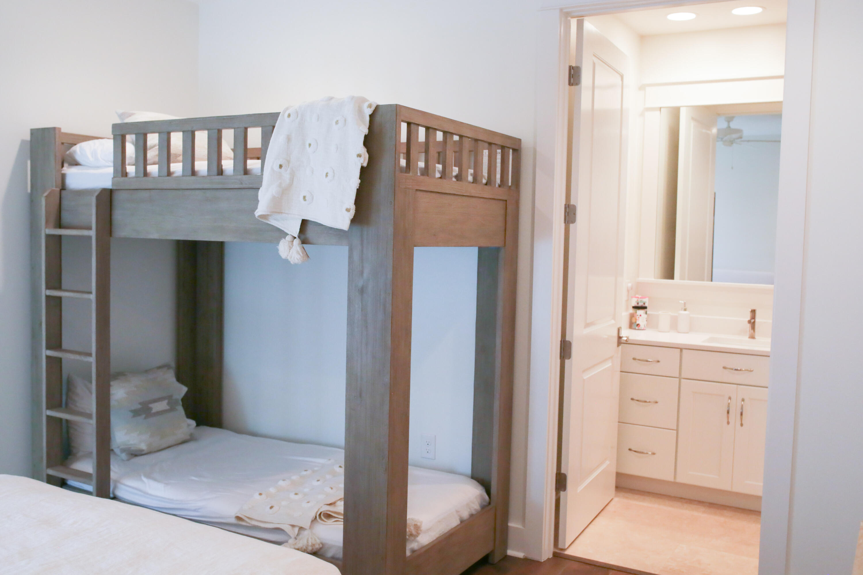 27 Somersault Lane Inlet Beach, FL 32461 - Photo 12 of 42 a bedroom with a bed and a mirror