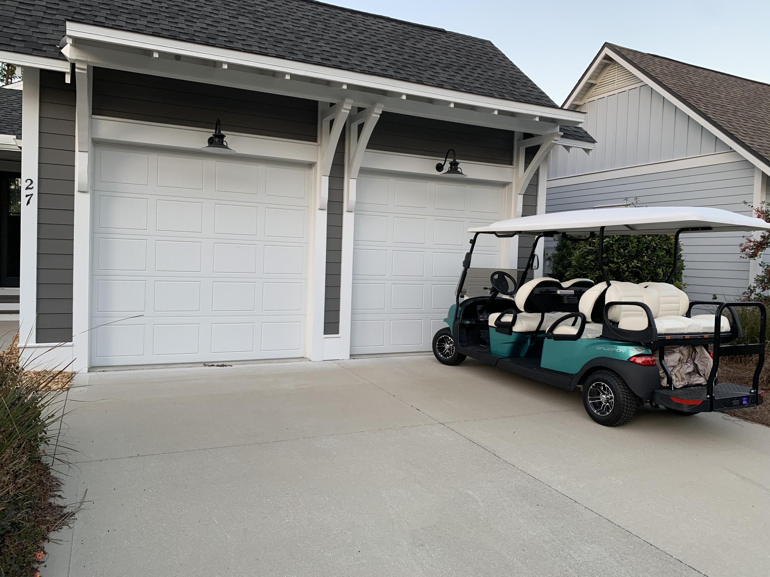 27 Somersault Lane Inlet Beach, FL 32461 - Photo 30 of 42 a car parked in garage