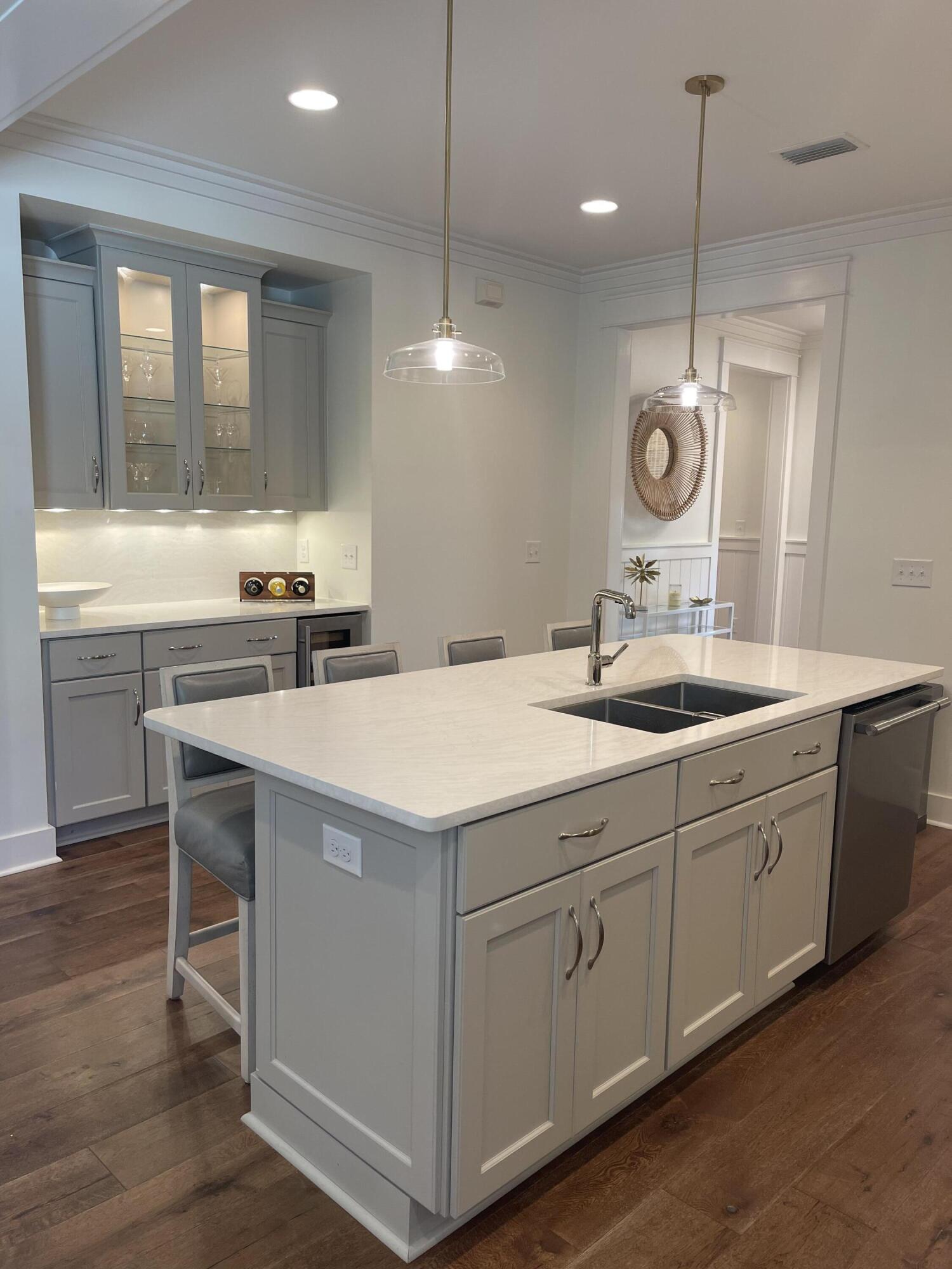 27 Somersault Lane Inlet Beach, FL 32461 - Photo 38 of 42 a bathroom with a sink a vanity and a large mirror