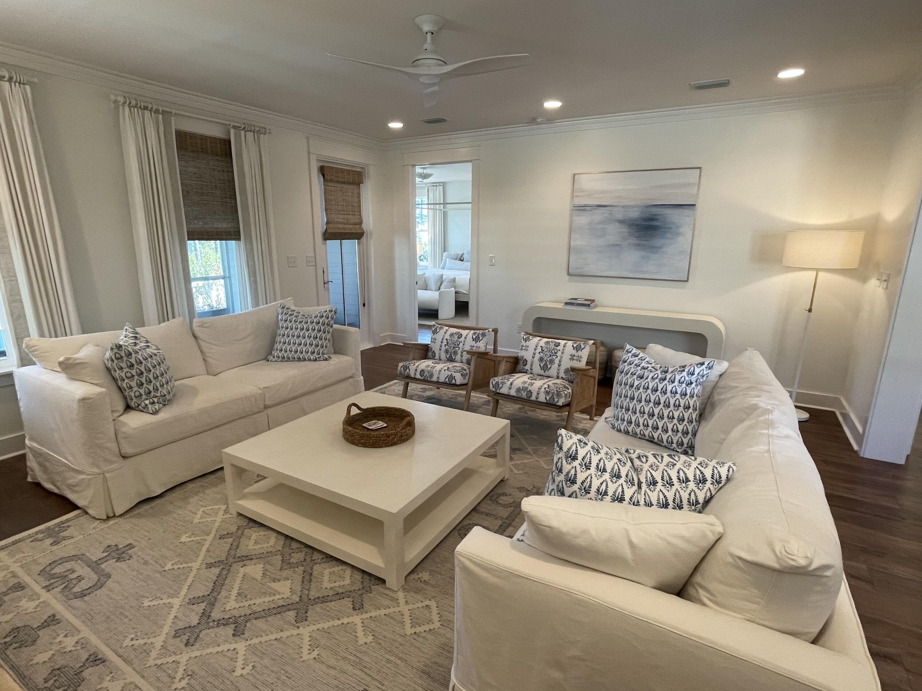 27 Somersault Lane Inlet Beach, FL 32461 - Photo 39 of 42 a living room with furniture and a wooden floor