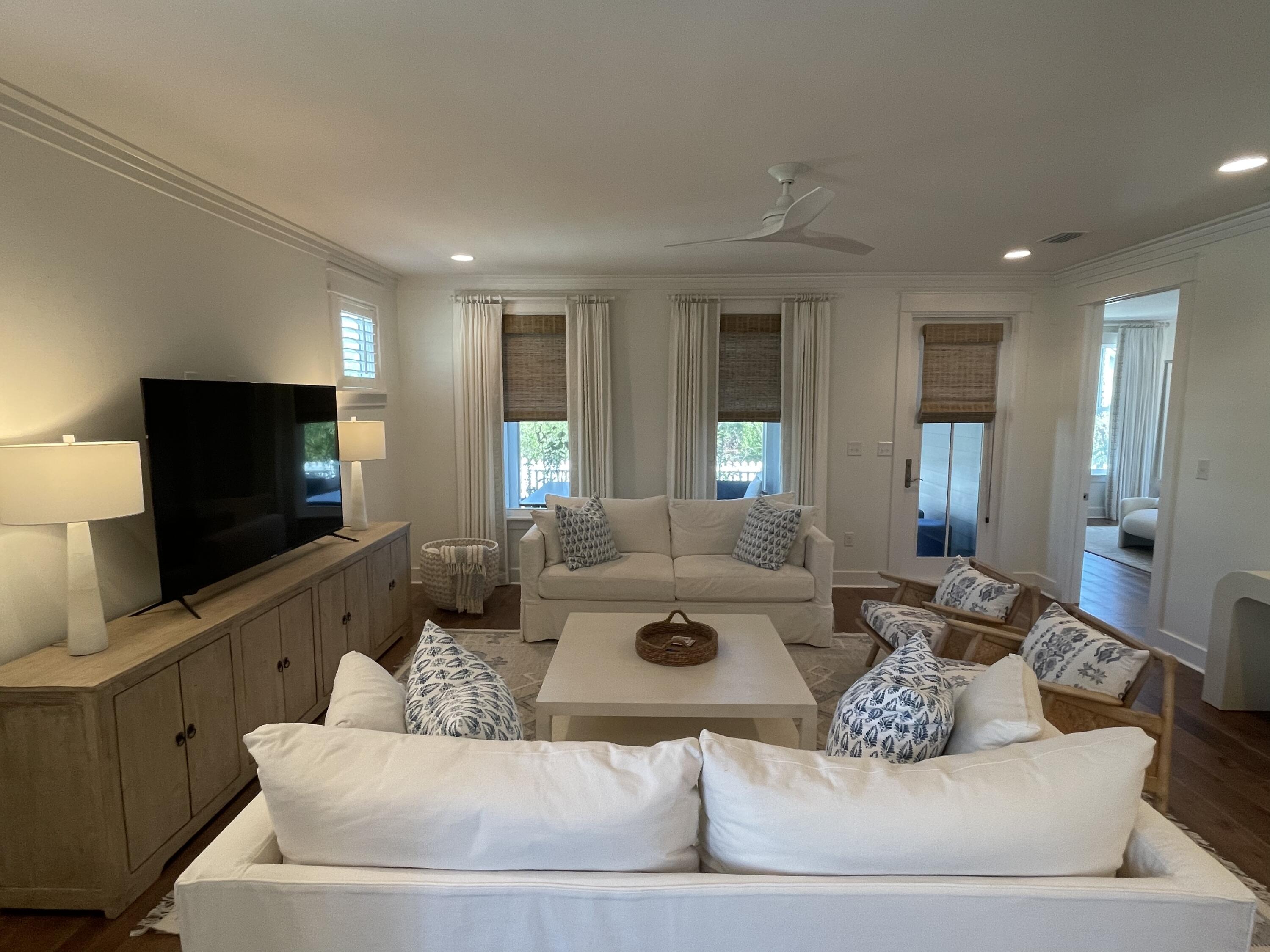 27 Somersault Lane Inlet Beach, FL 32461 - Photo 40 of 42 a living room with furniture and a flat screen tv