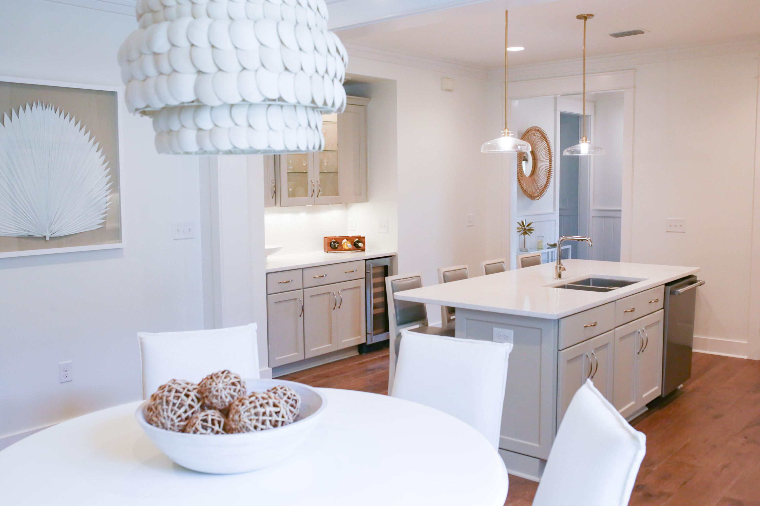 27 Somersault Lane Inlet Beach, FL 32461 - Photo 9 of 42 a kitchen with a sink a table and chairs