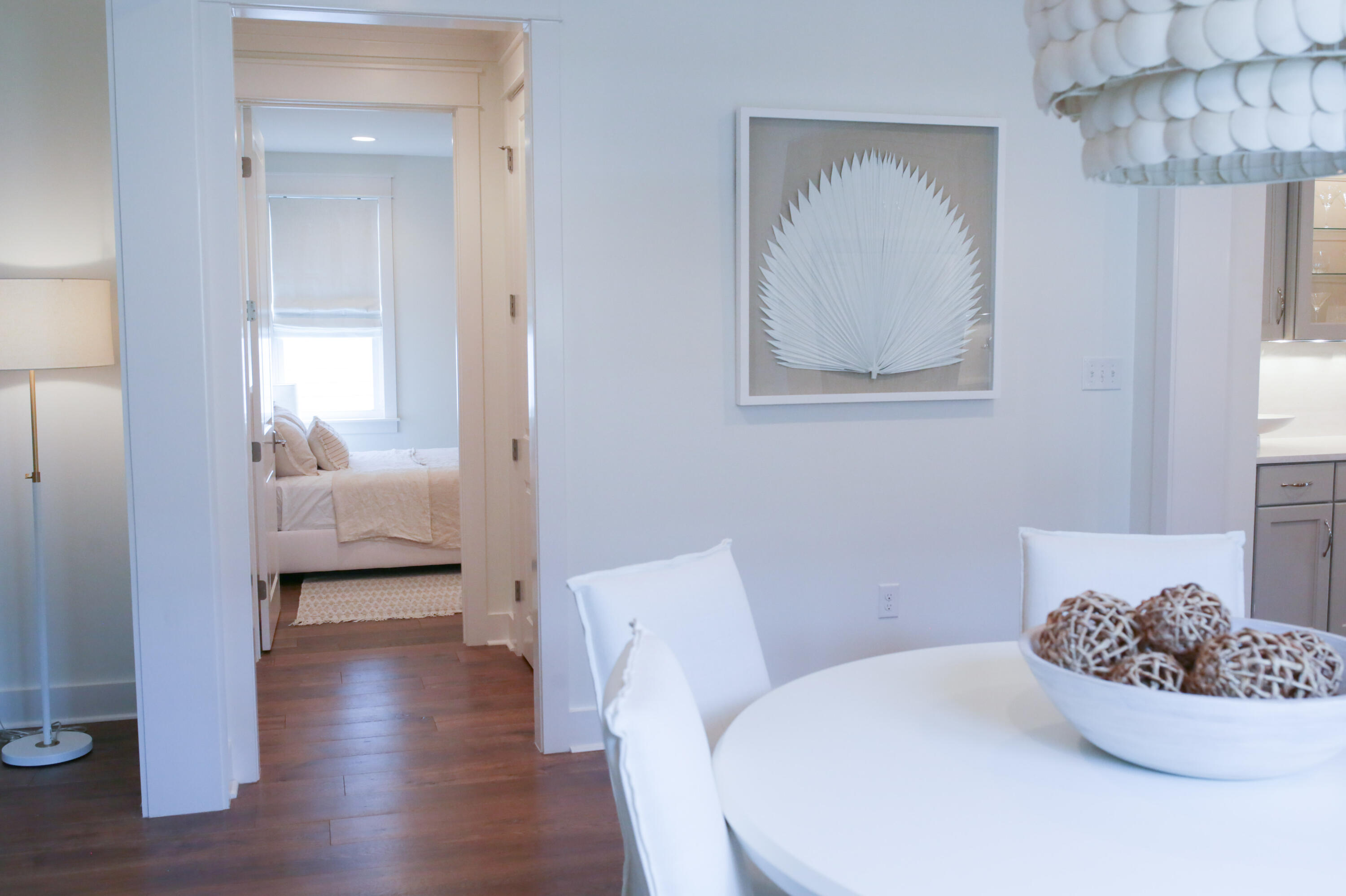 27 Somersault Lane Inlet Beach, FL 32461 - Photo 10 of 42 a hallway with a couch and a potted plant