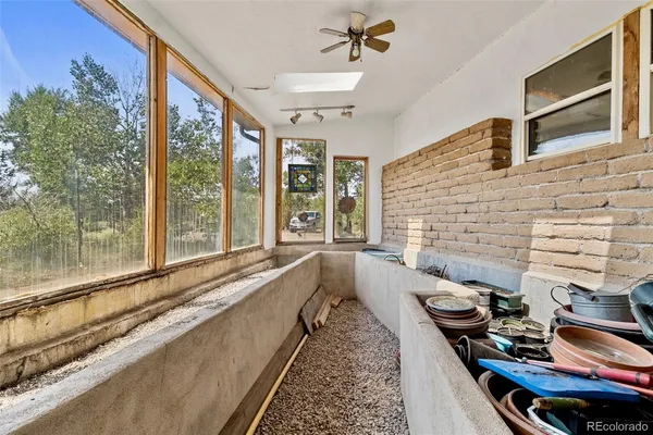 a view of a living room and kitchen