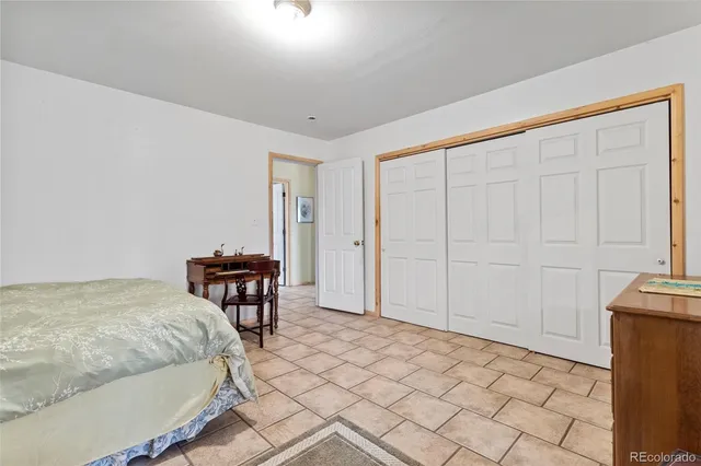 a view of a hallway with staircase