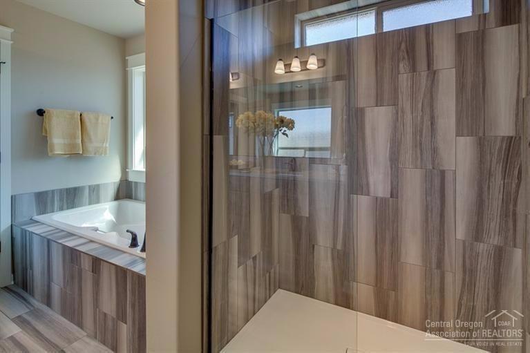 61104 Southeast Stari Most Loop Bend, OR 97702 - Photo 15 of 24 Designer tile surround in shower. Relax