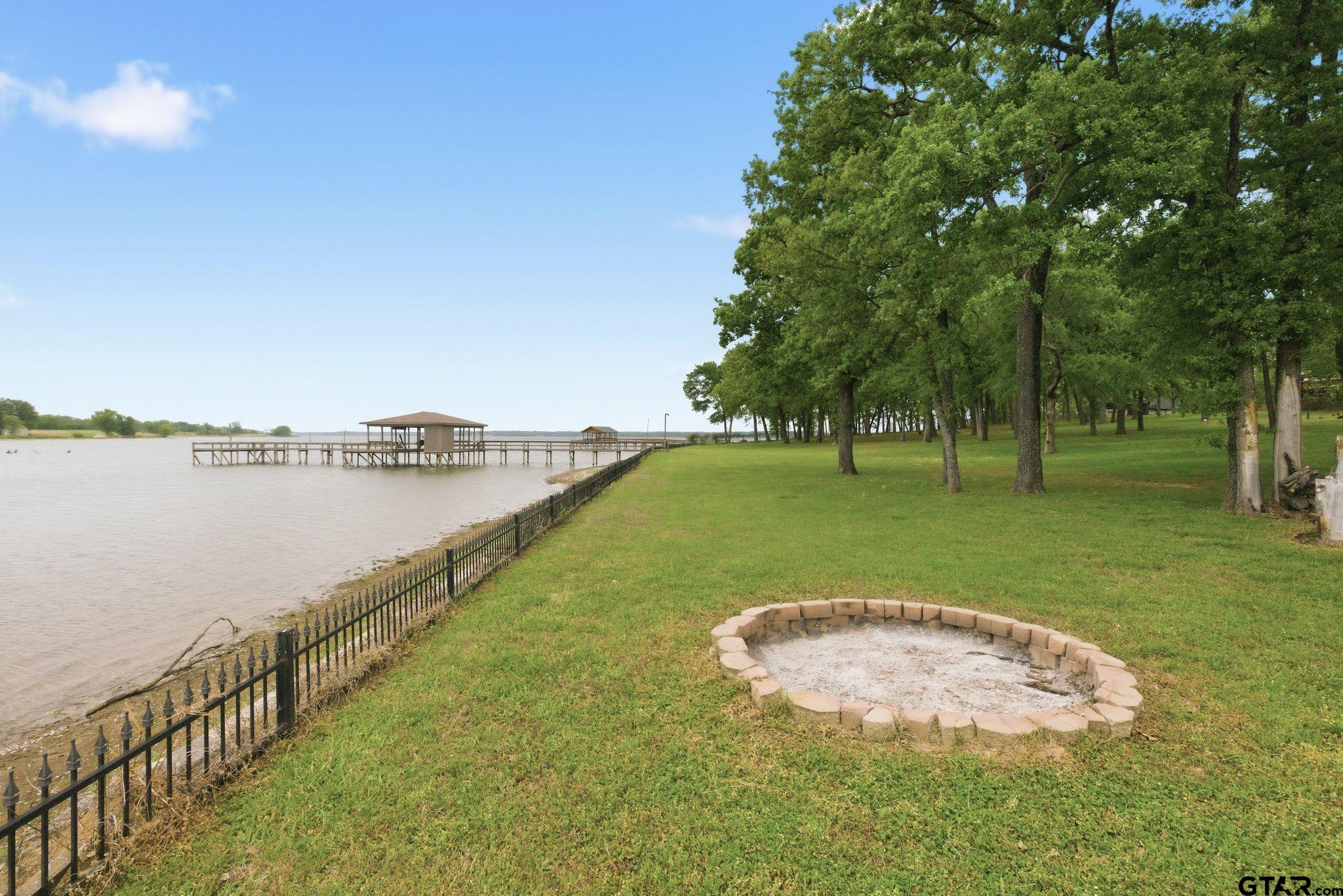 511 Rcr 3346 Emory, TX 75440 - Photo 11 of 48 a view of a lake with a big yard