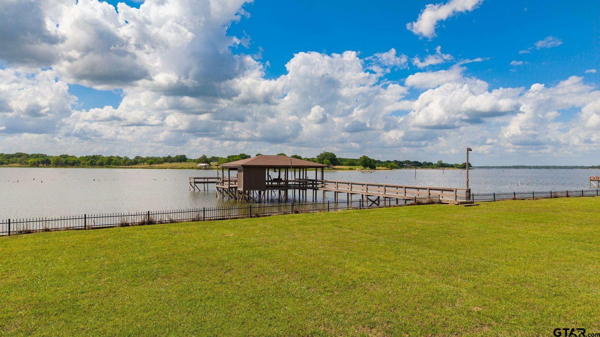 511 Rcr 3346 Emory, TX 75440 - Photo 12 of 48 a view of a lake with houses in the background