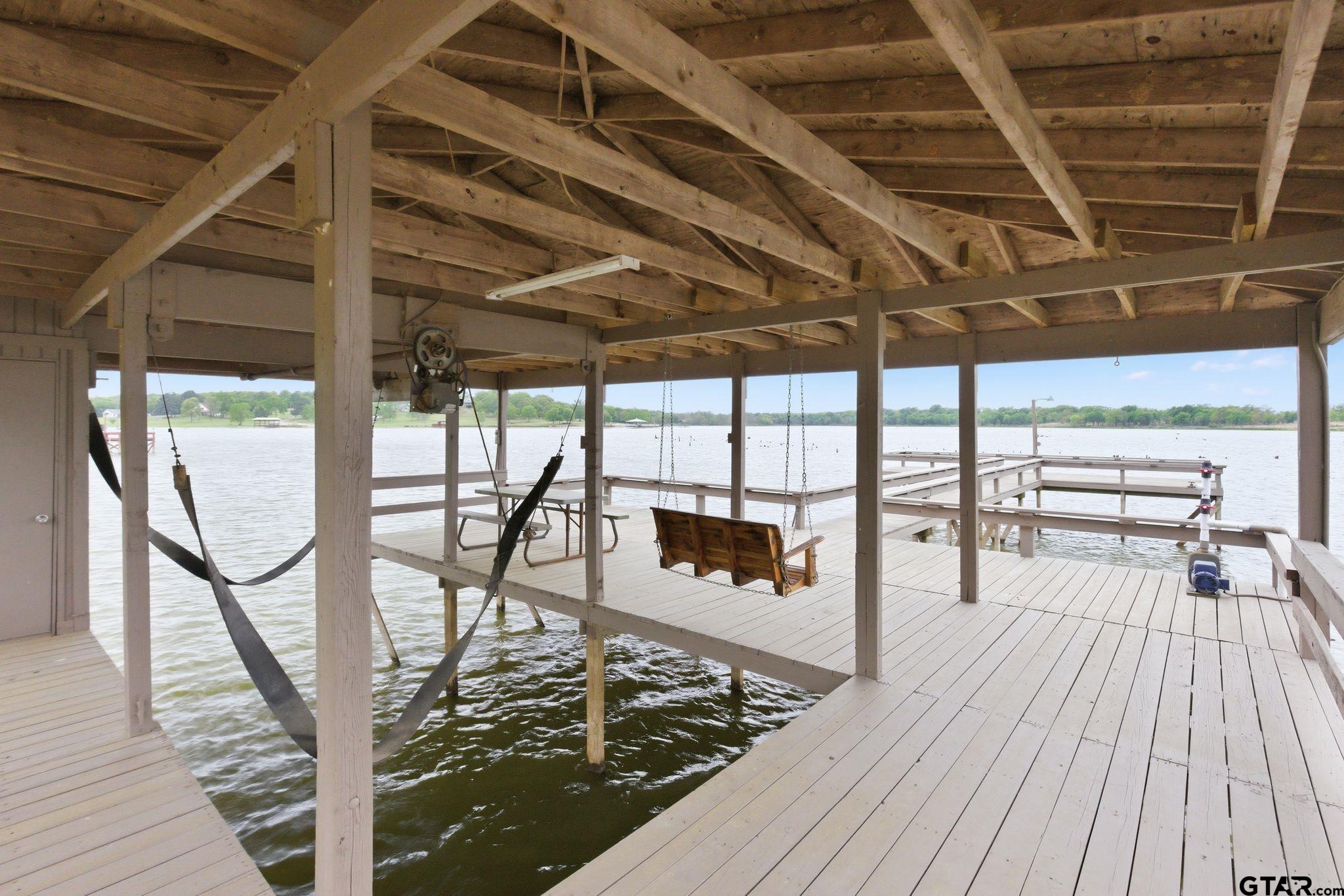 511 Rcr 3346 Emory, TX 75440 - Photo 15 of 48 a view of a porch with wooden floor