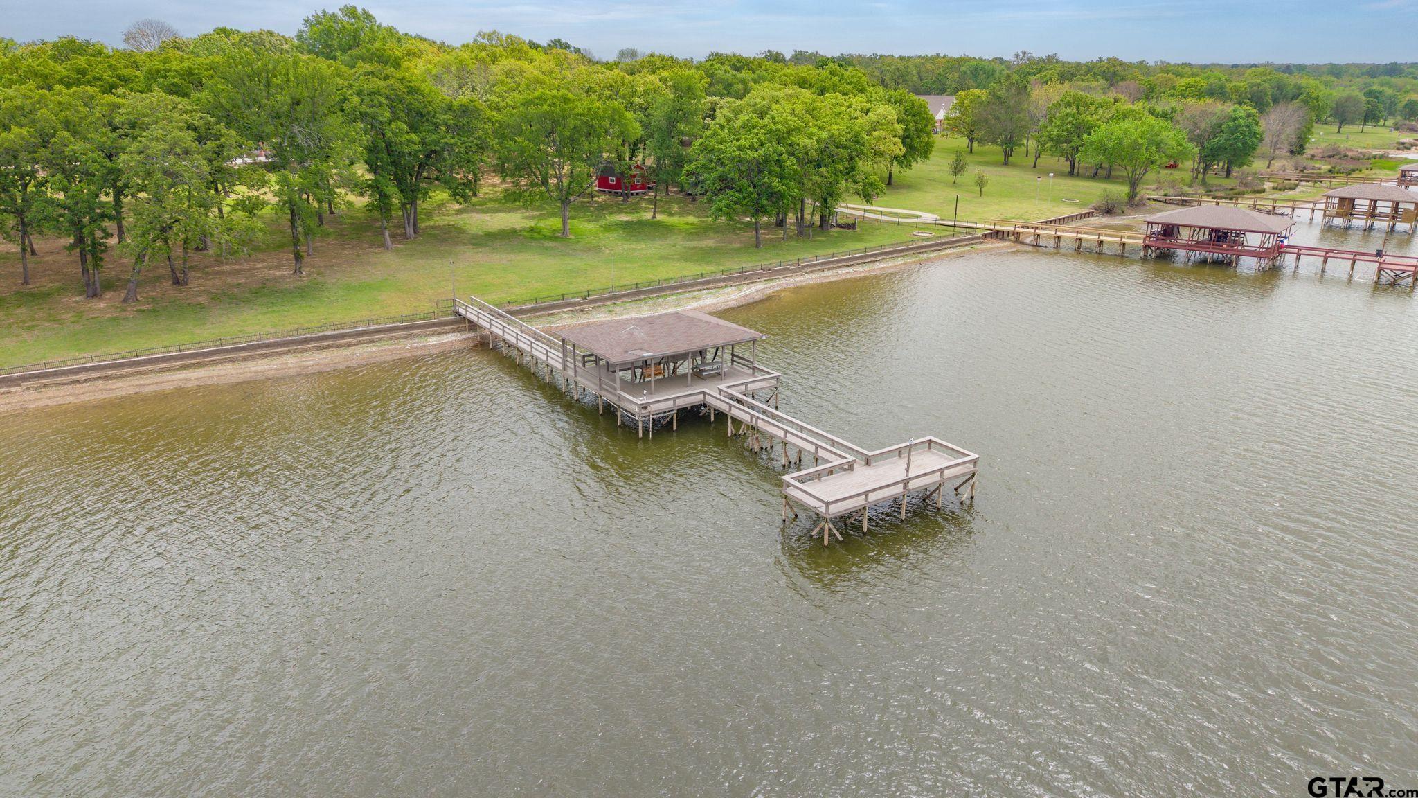 511 Rcr 3346 Emory, TX 75440 - Photo 23 of 48 a view of a lake with a mountain