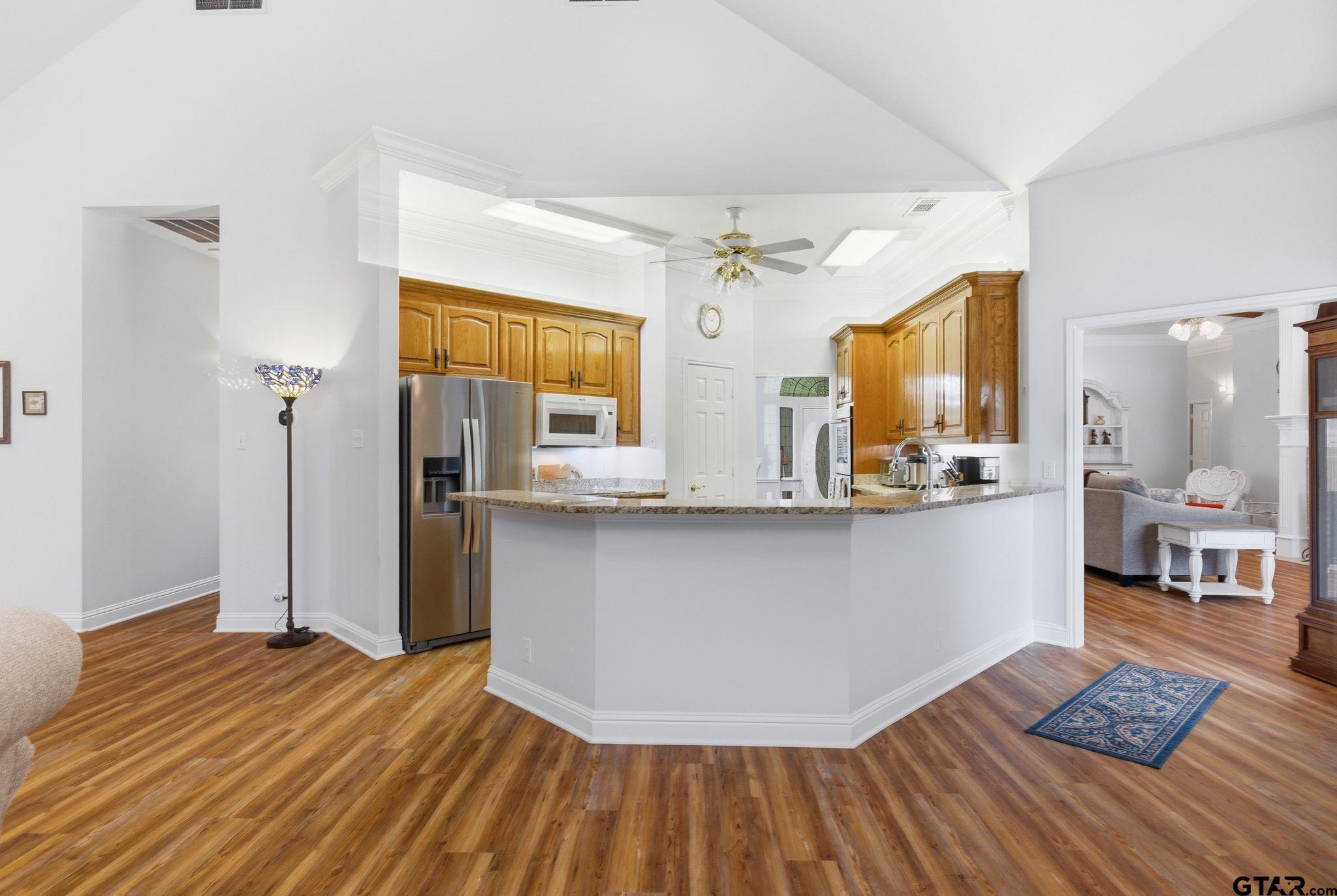 511 Rcr 3346 Emory, TX 75440 - Photo 29 of 48 a living room with stainless steel appliances kitchen island granite countertop furniture and a kitchen view