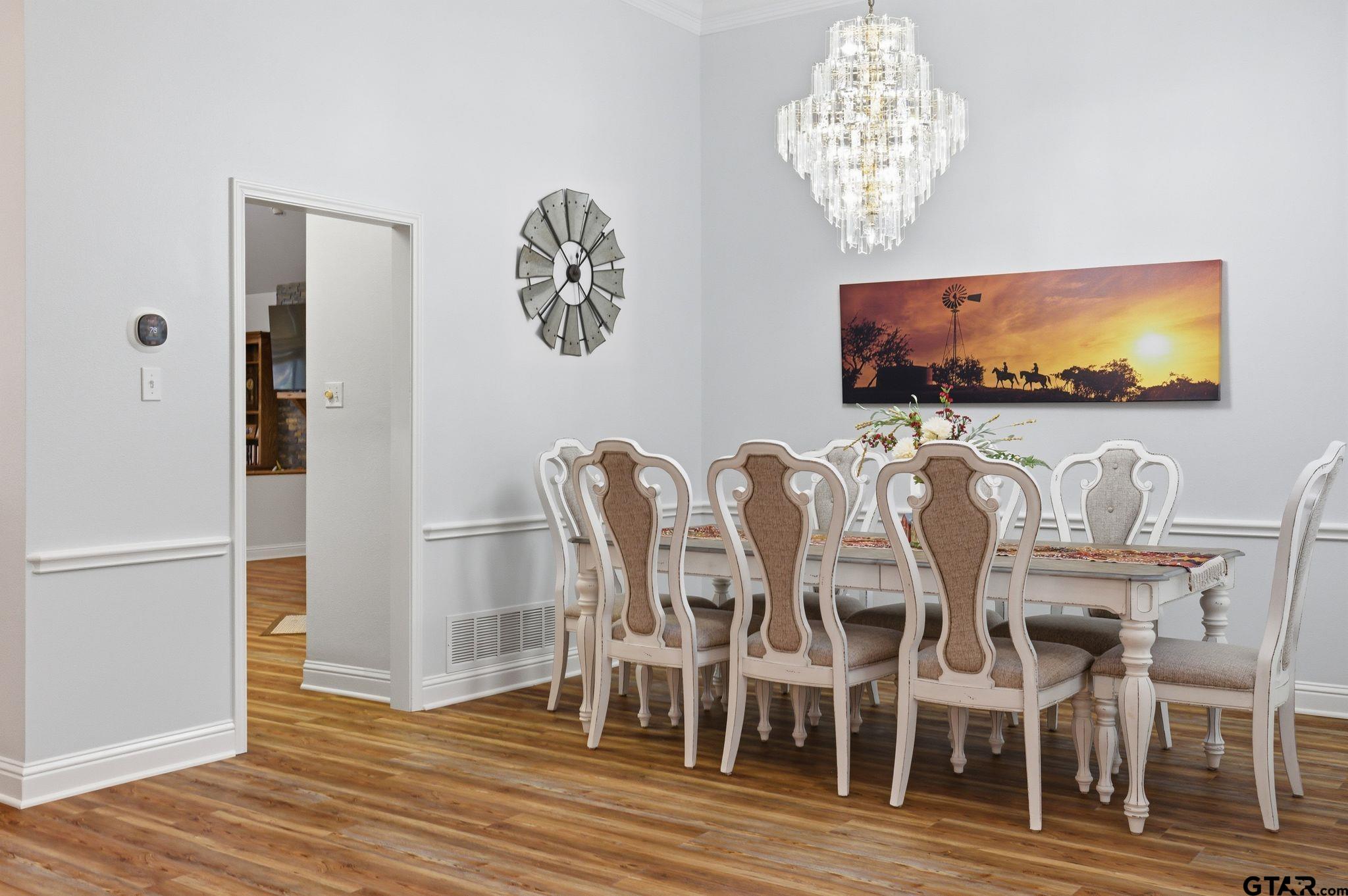 511 Rcr 3346 Emory, TX 75440 - Photo 35 of 48 a view of a dining room with furniture wooden floor and chandelier