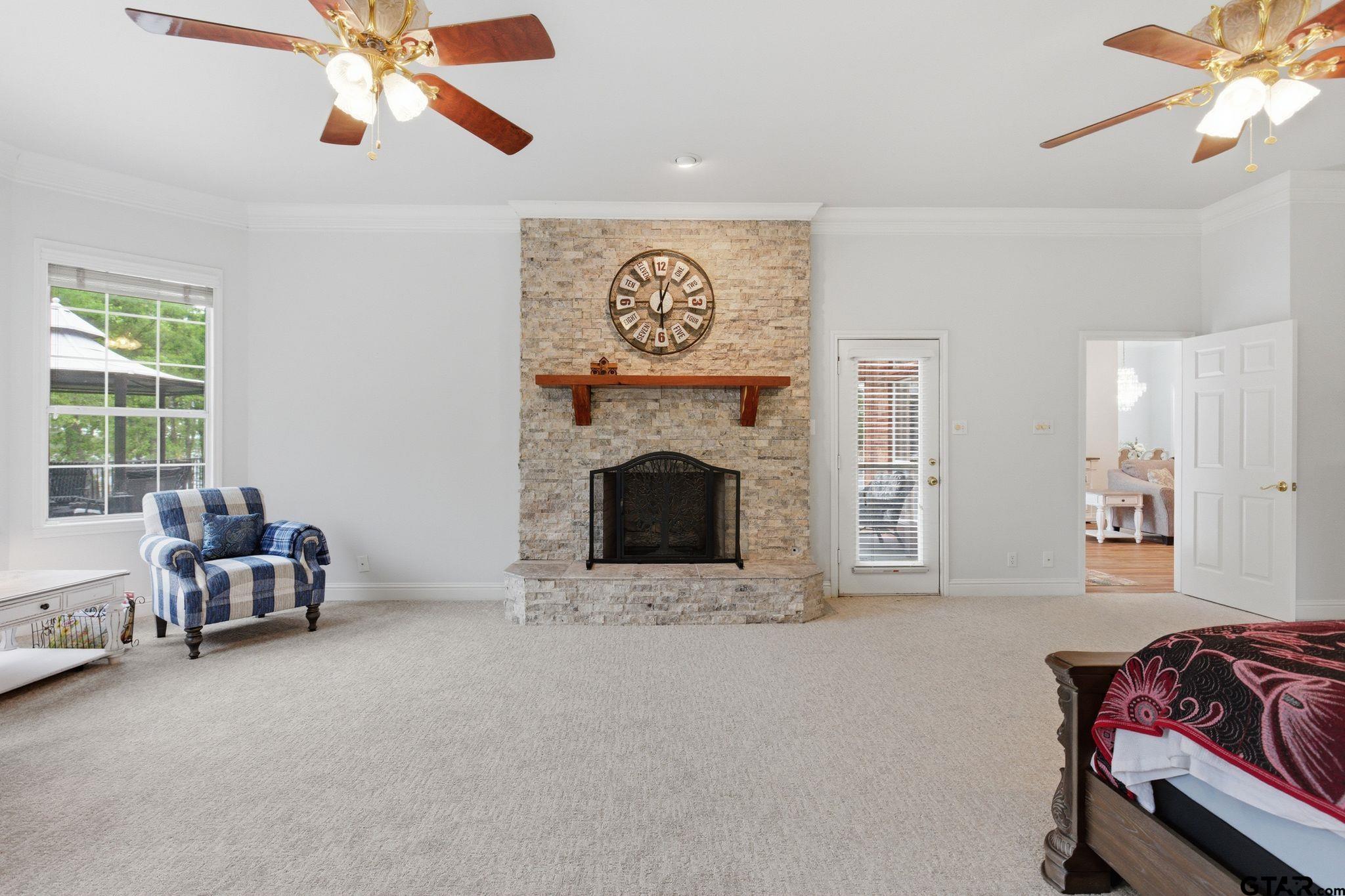 511 Rcr 3346 Emory, TX 75440 - Photo 37 of 48 a living room with furniture and a fireplace