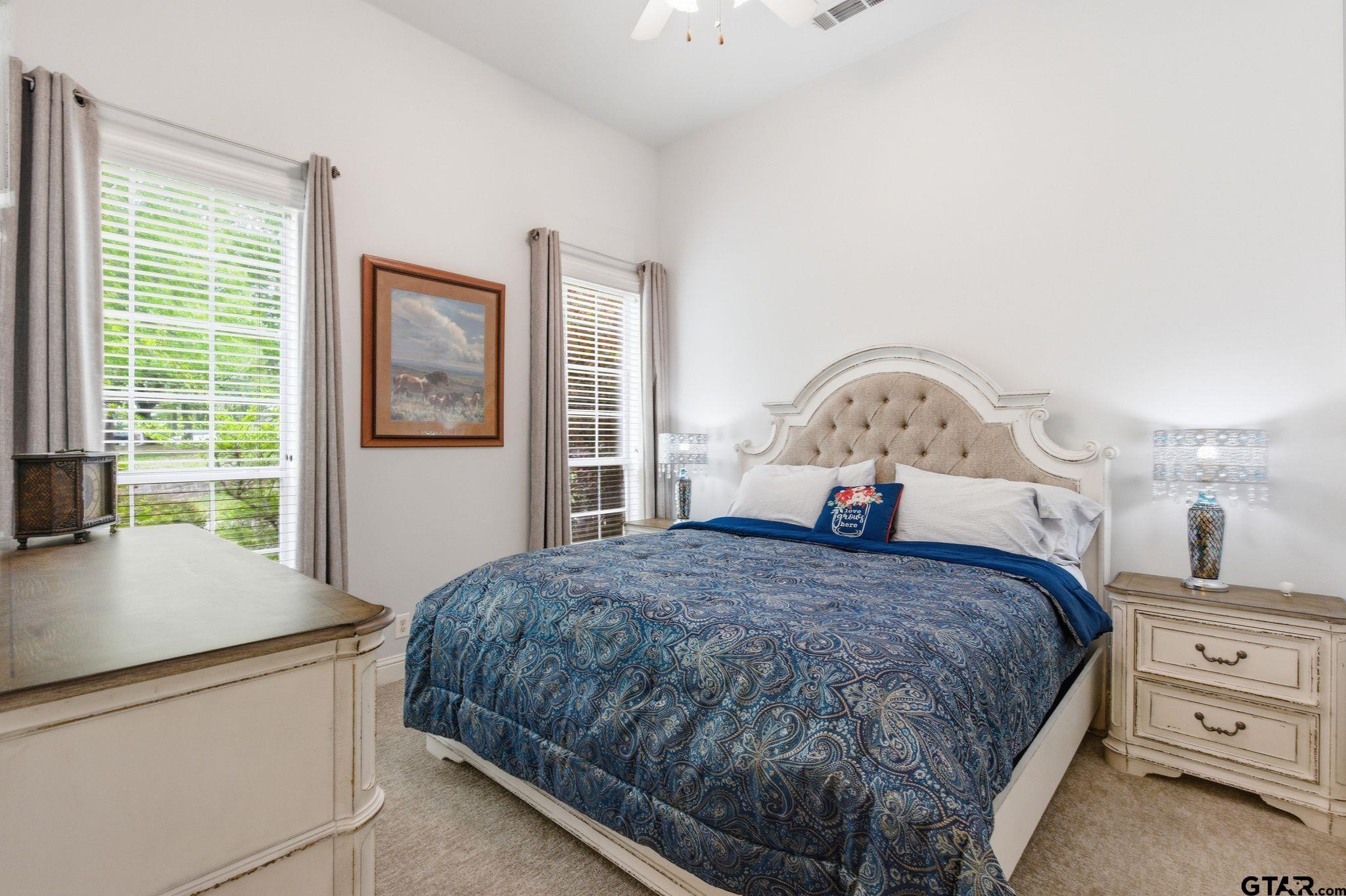 511 Rcr 3346 Emory, TX 75440 - Photo 42 of 48 a bedroom with a large bed and a window