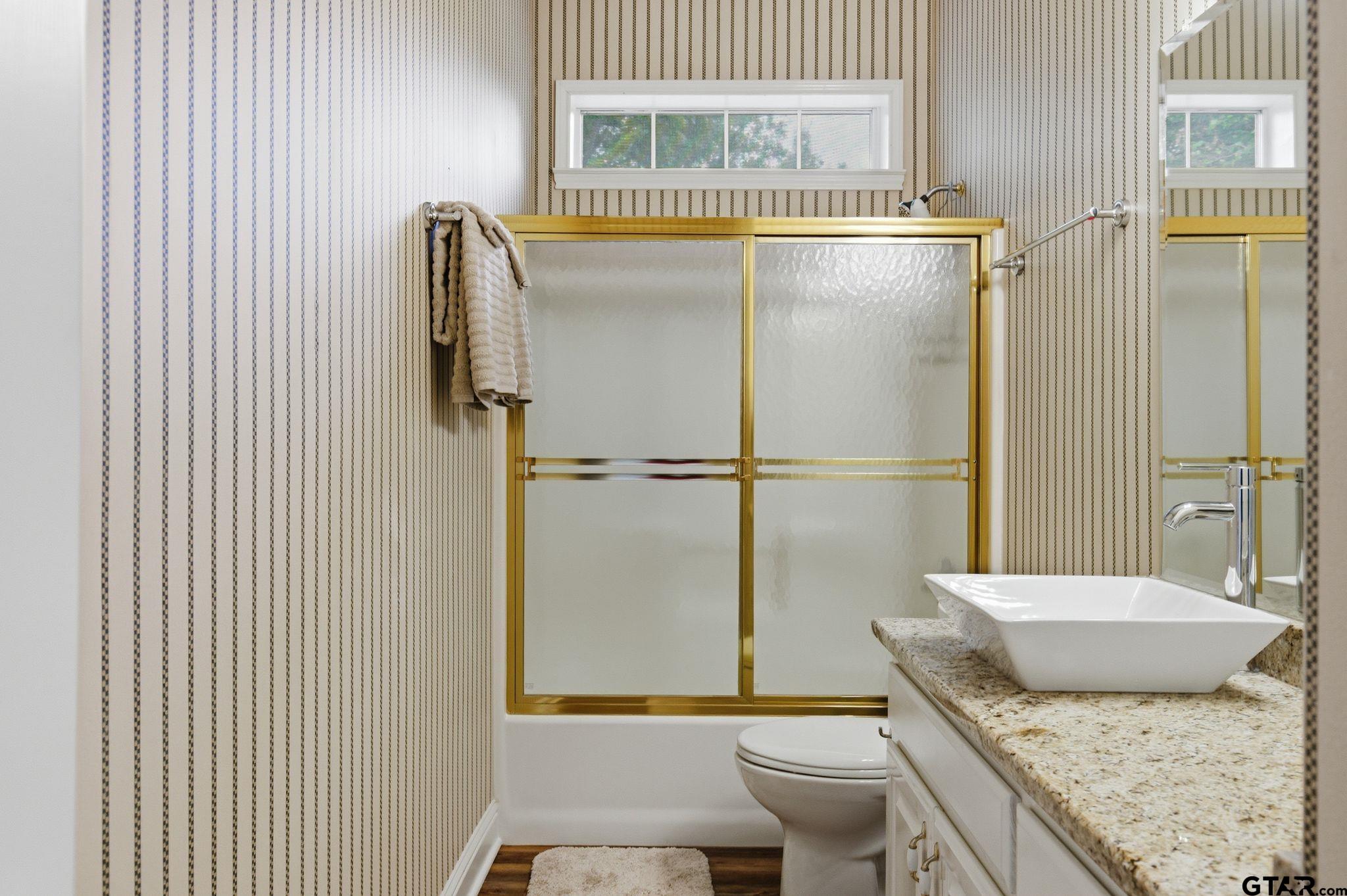 511 Rcr 3346 Emory, TX 75440 - Photo 45 of 48 a bathroom with a granite countertop sink and a mirror