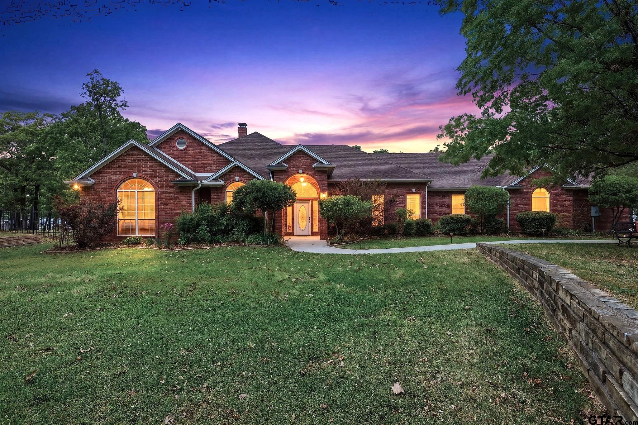 511 Rcr 3346 Emory, TX 75440 - Photo 6 of 48 a front view of a house with a yard