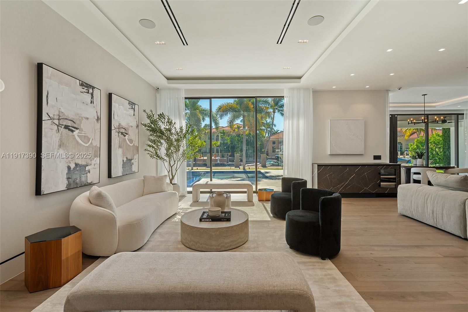 900 Washington Street Hollywood, FL 33019 - Photo 14 of 61 a living room with furniture and a large window