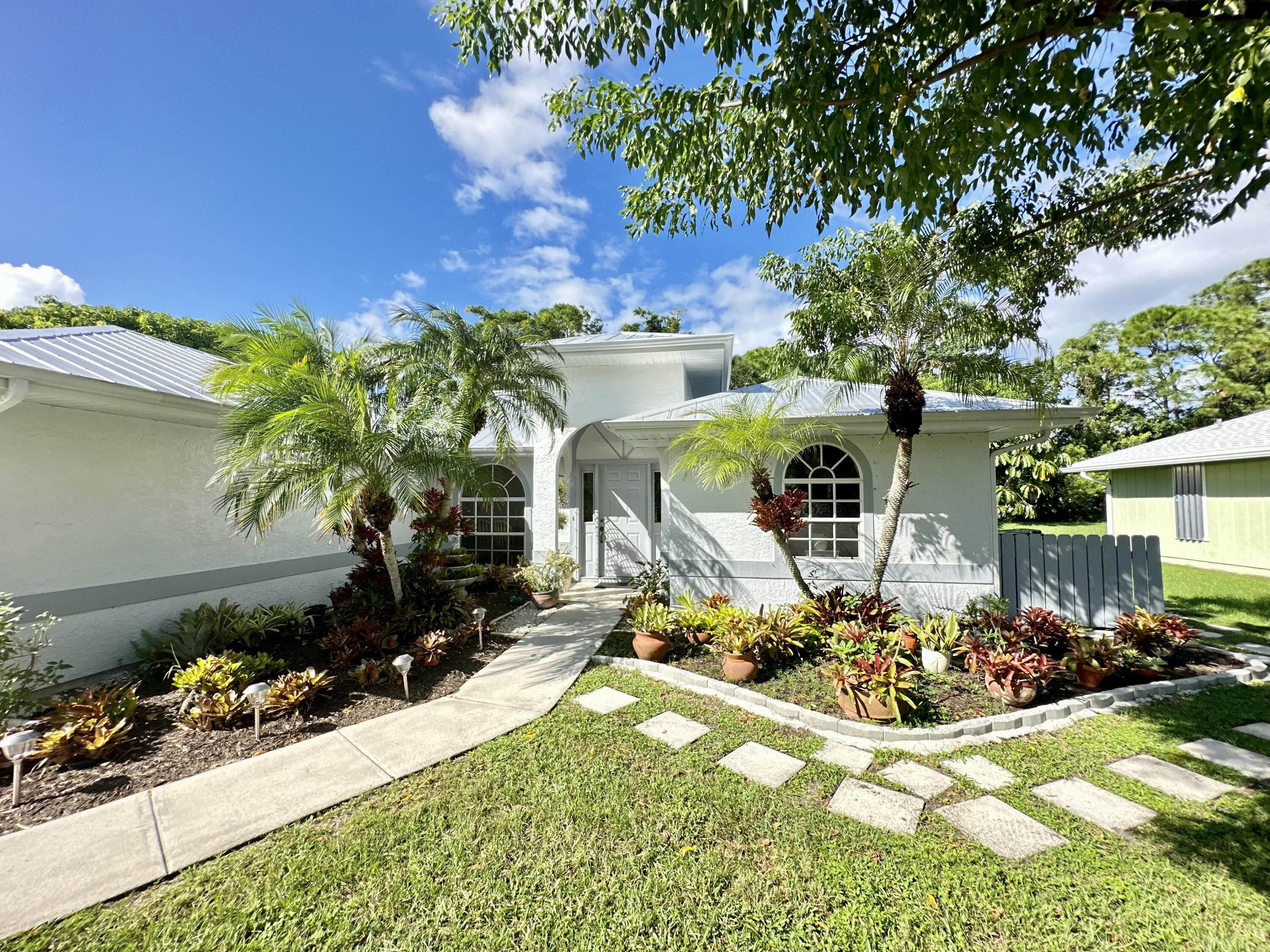 2279 Southeast Blossom Road Port St. Lucie, FL 34952 - Photo 1 of 38 335E6E82-435E-499F-8F08-46D9DD02739C