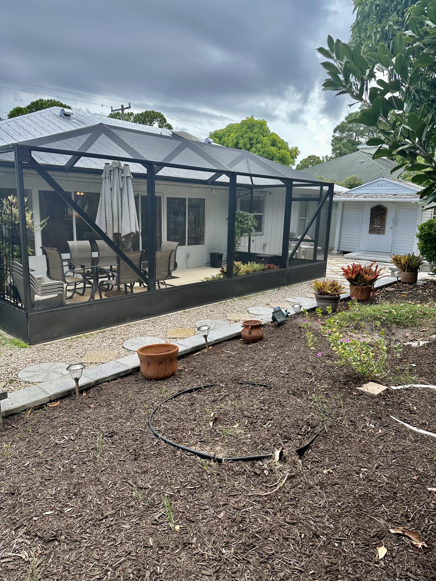 2279 Southeast Blossom Road Port St. Lucie, FL 34952 - Photo 20 of 38 Enclosure Patio