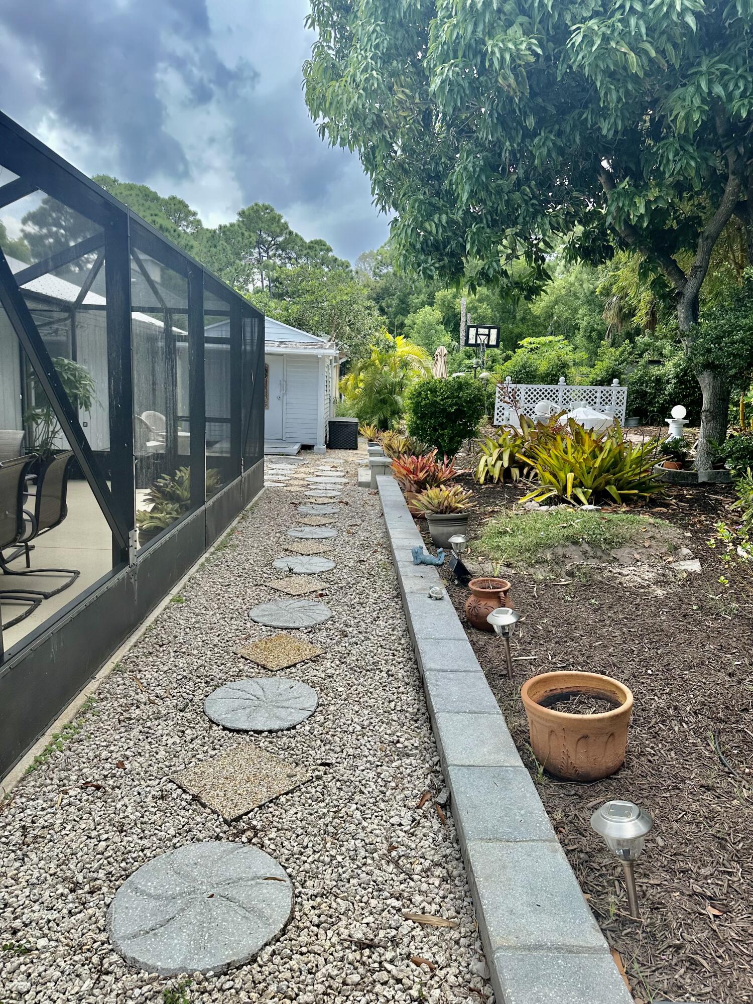2279 Southeast Blossom Road Port St. Lucie, FL 34952 - Photo 21 of 38 Walk-in area to Shed