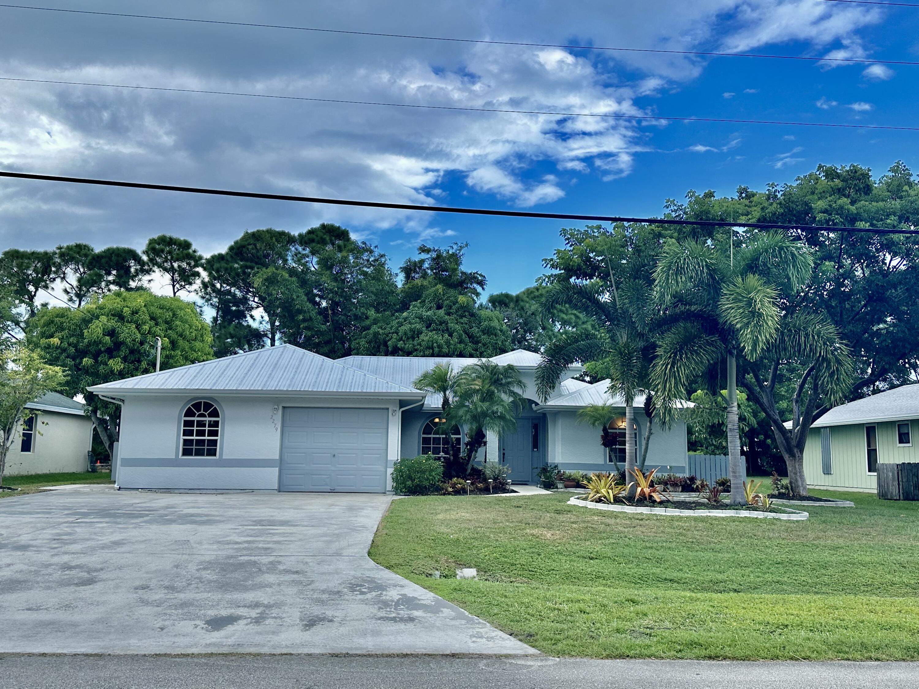 2279 Southeast Blossom Road Port St. Lucie, FL 34952 - Photo 30 of 38 BEB97362-663B-4F27-8F0B-537BDA9C6061