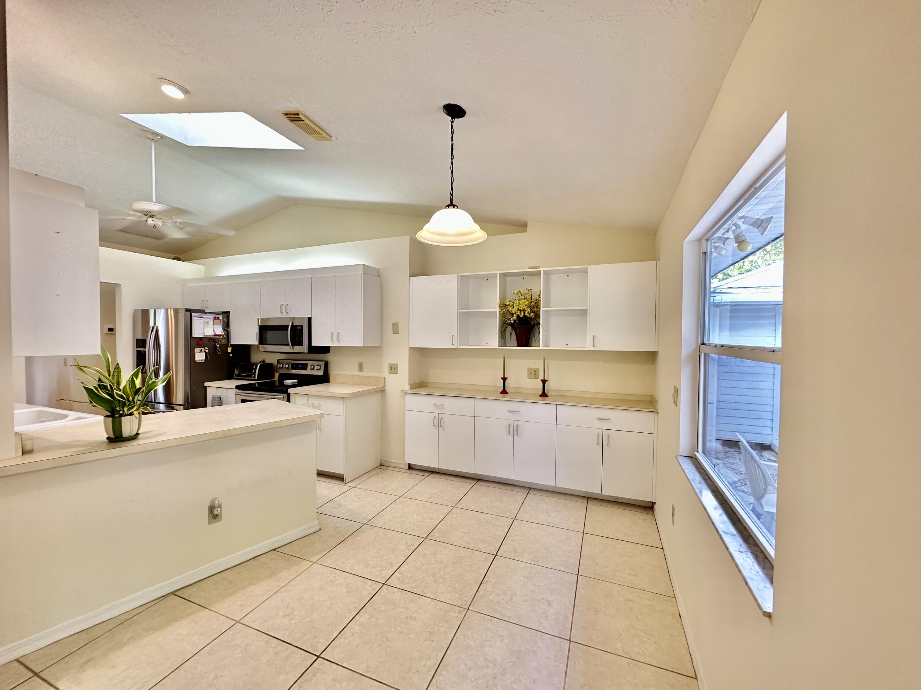 2279 Southeast Blossom Road Port St. Lucie, FL 34952 - Photo 3 of 38 Kitchen Plus Breakfast Area