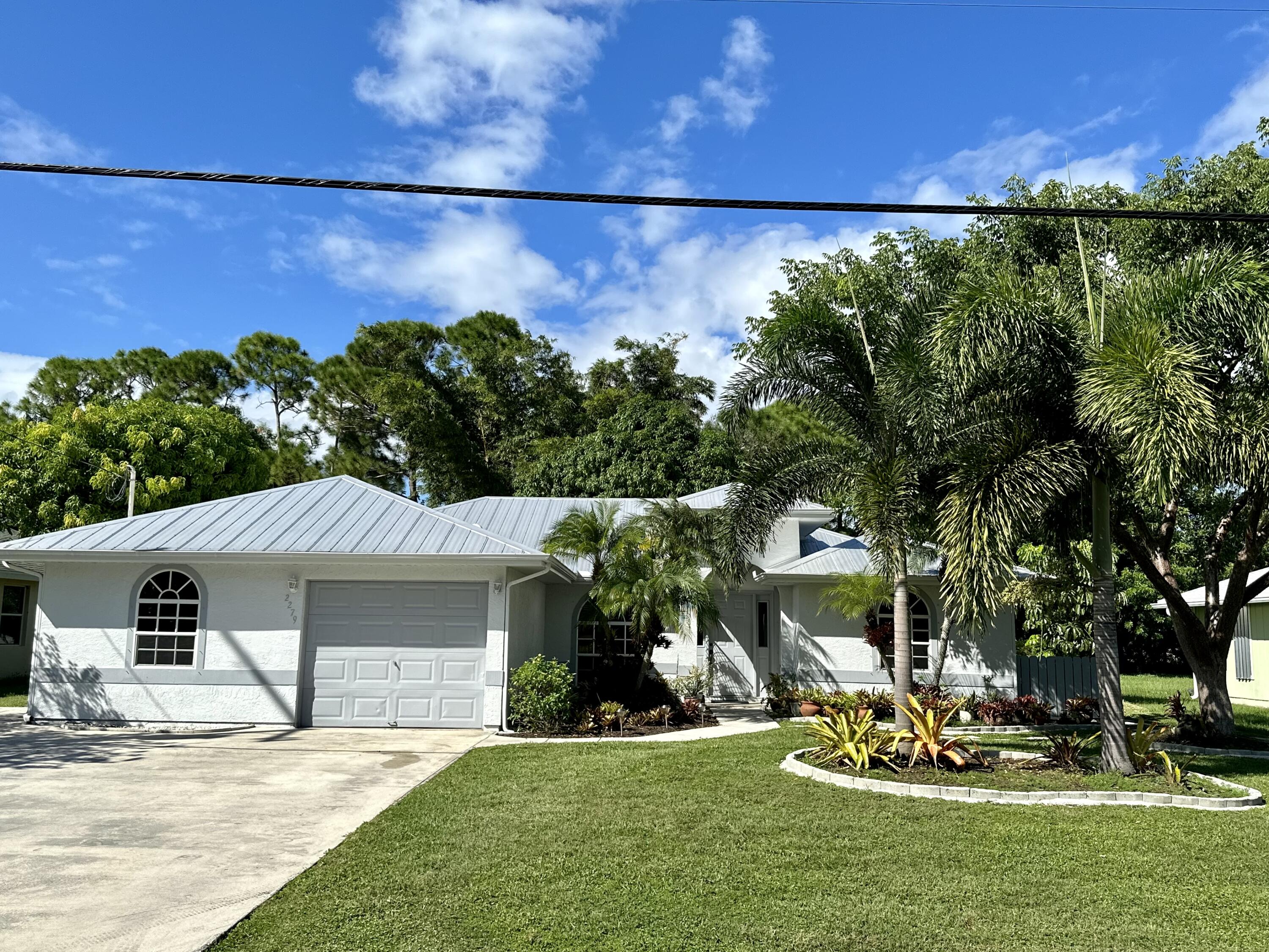 2279 Southeast Blossom Road Port St. Lucie, FL 34952 - Photo 35 of 38 9ADFE35E-BDA5-4BA4-9428-8C20B63506B5