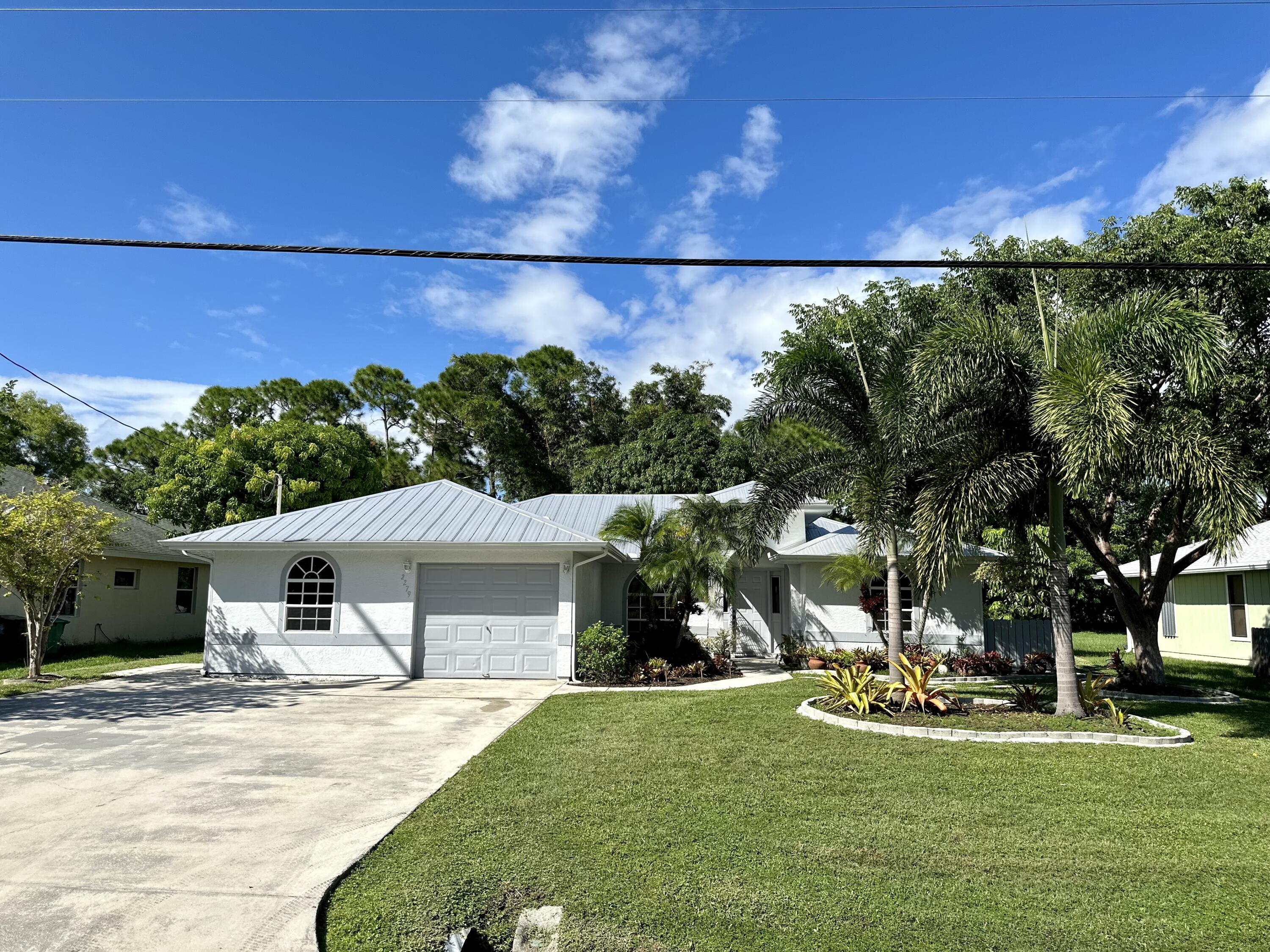 2279 Southeast Blossom Road Port St. Lucie, FL 34952 - Photo 36 of 38 B142FFE1-C62F-4103-BFD3-255907B0BA6D