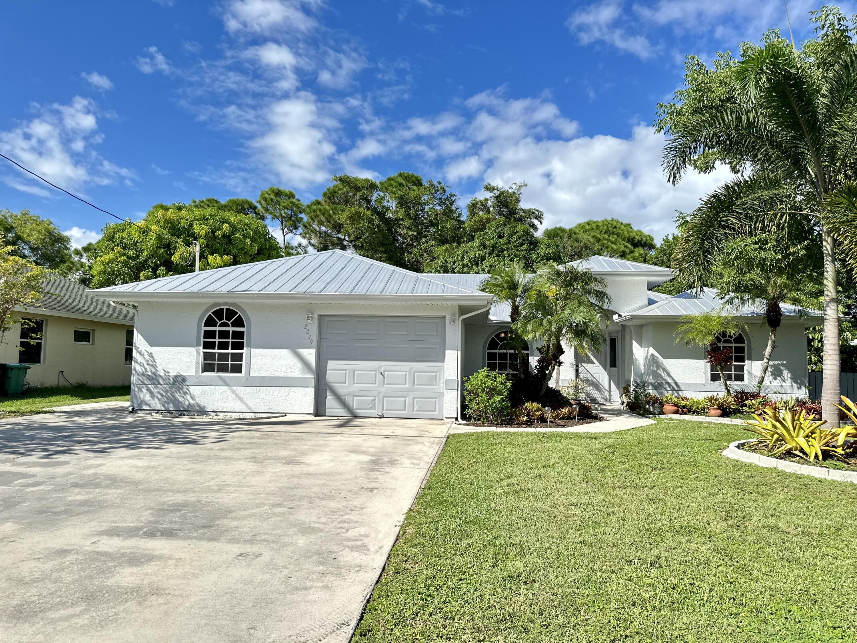 2279 Southeast Blossom Road Port St. Lucie, FL 34952 - Photo 38 of 38 E14DF079-505D-41D6-B77C-35B8B24DB2EA