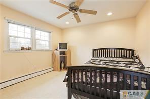 18 Devon Road Edison, NJ 08820 - Photo 21 of 25 a bedroom with furniture and a window